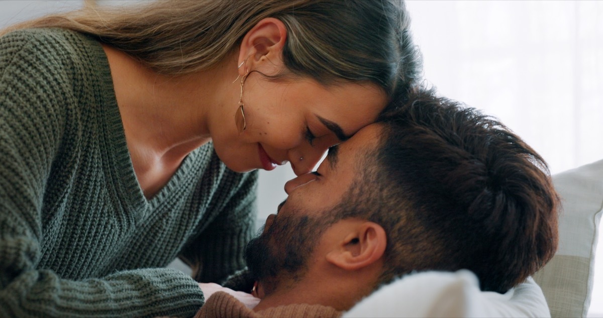 man and woman embracing in a romantic moment