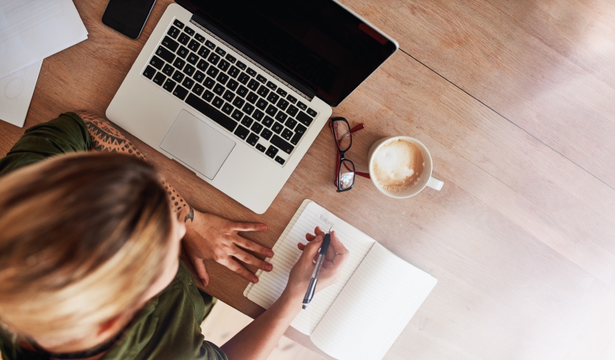 Woman making to-do list christmas depression