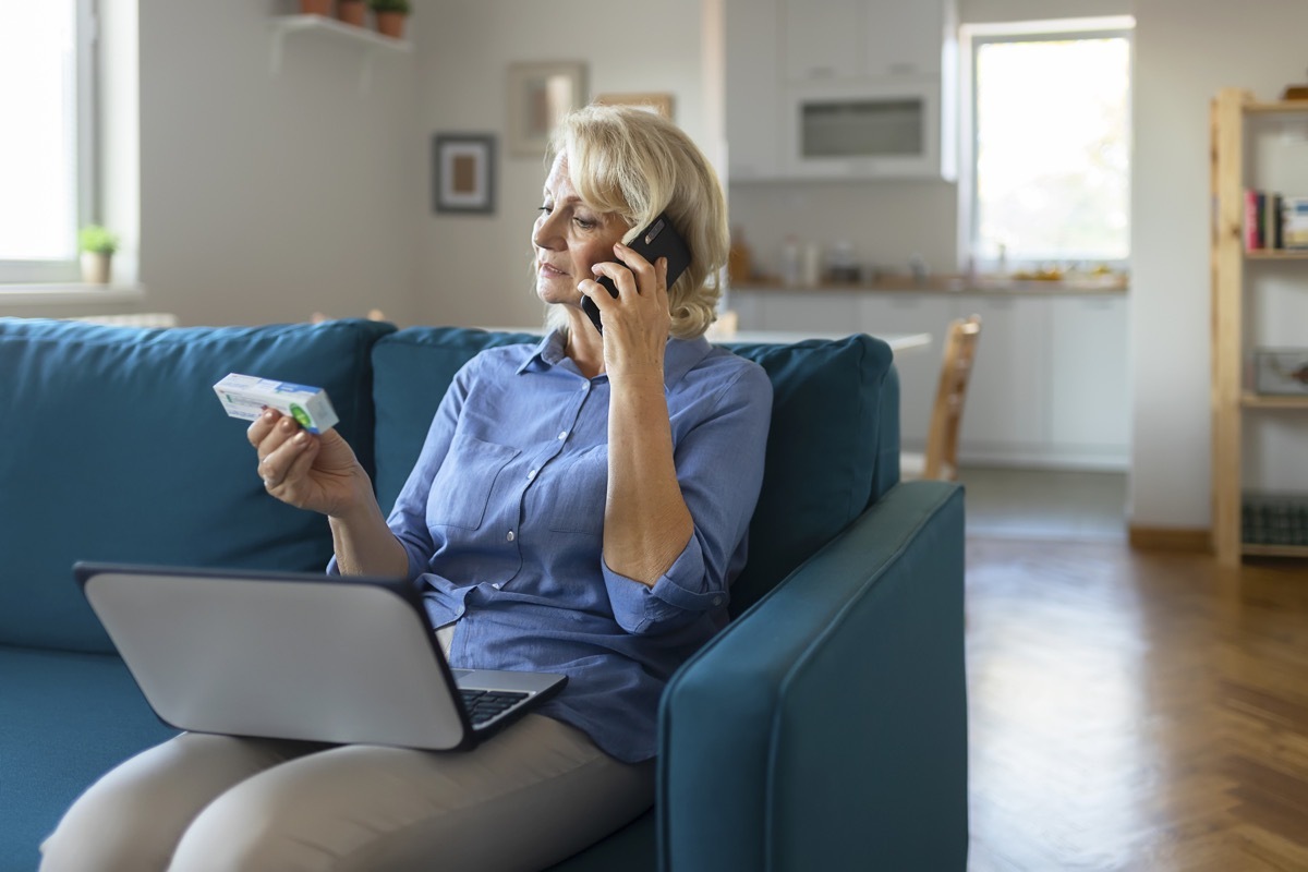 Senior Woman Talking on Smartphone with her Doctor to Inform about Medication Instructions. Elderly Woman Checking Medical Information While Using Mobile Phone (Senior Woman Talking on Smartphone with her Doctor to Inform about Medication Instructions