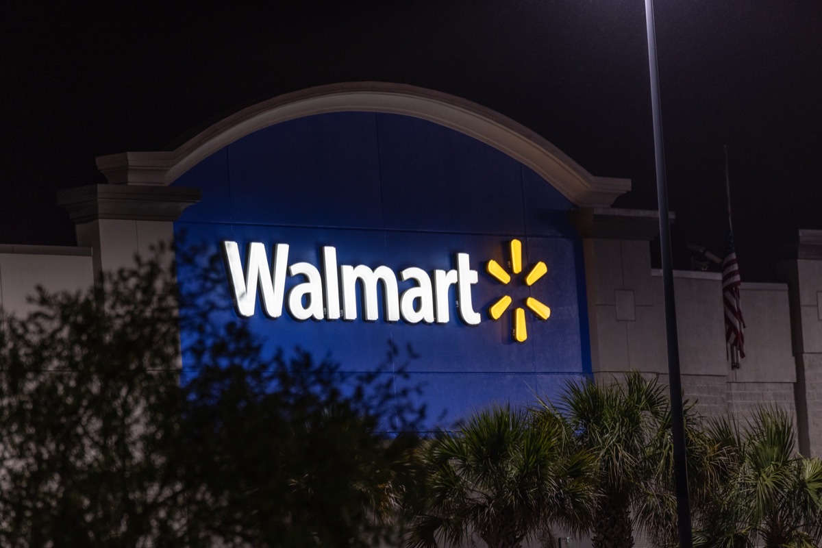 walmart sign on store exterior at night