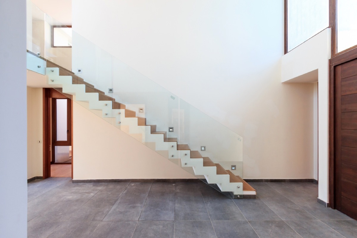 staircase with glass banister, 80s interior design 