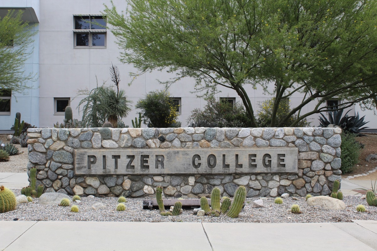 Claremont, CA/USA: March 21, 2017 –Entrance sign at Pitzer College one of the seven schools known collectively as the Claremont Colleges. The coed private college is 35 miles east of Los Angeles. - Image