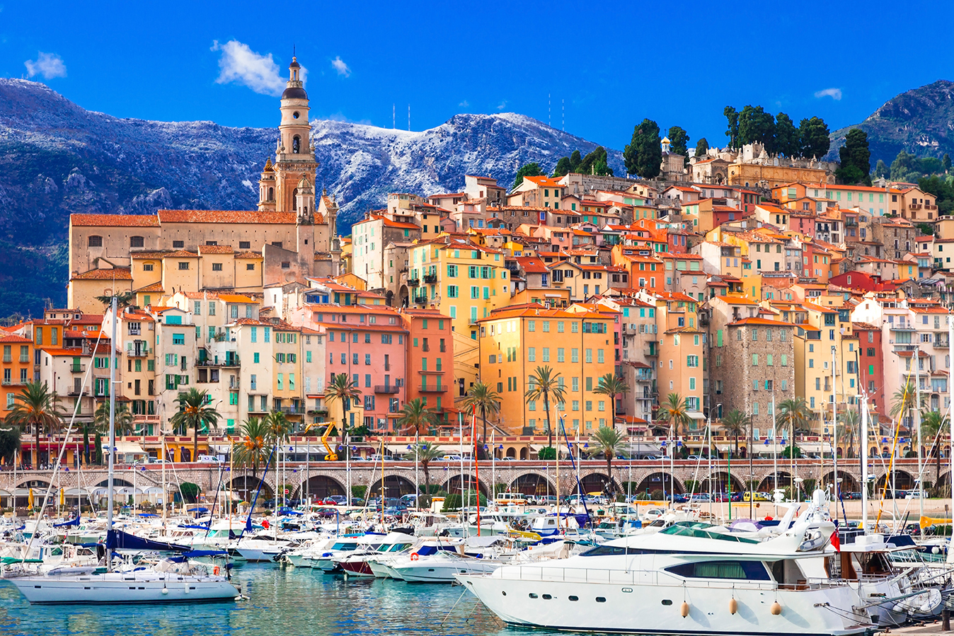 bright yellow and orange buildings in menton, france