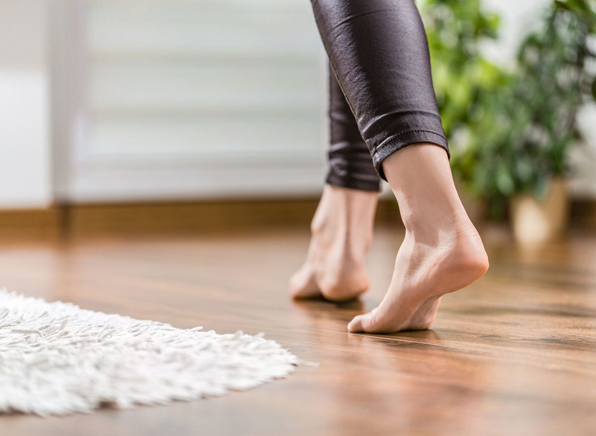 Woman walking around house