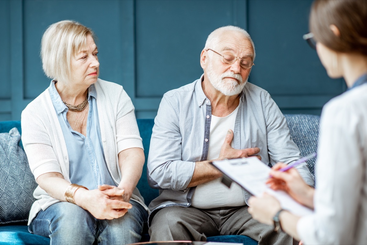 Senior couple talking to doctor