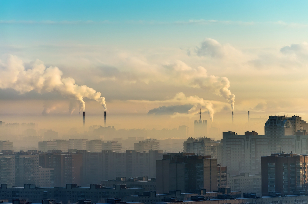 smokestacks clog up air in city