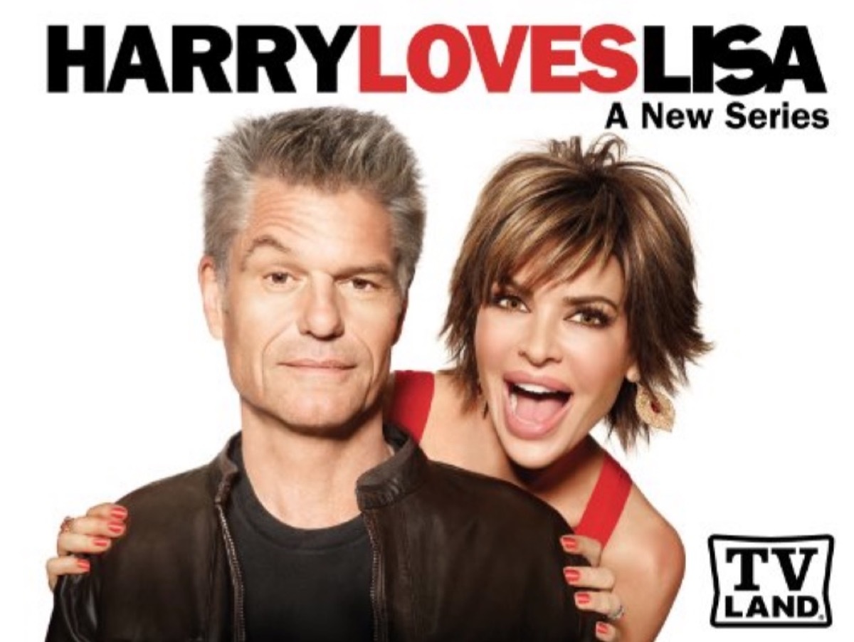 lisa rinna looking over harry hamlin's shoulder on white background