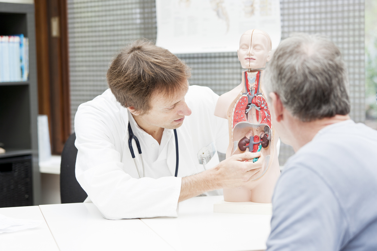 Doctor explaining urological problems to patient.