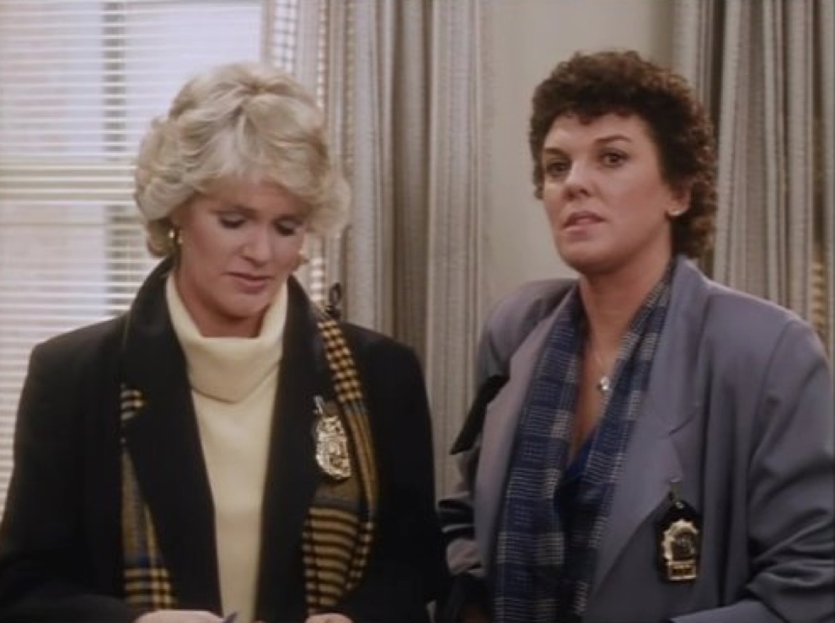 Cagney and Lacey standing next to each other 