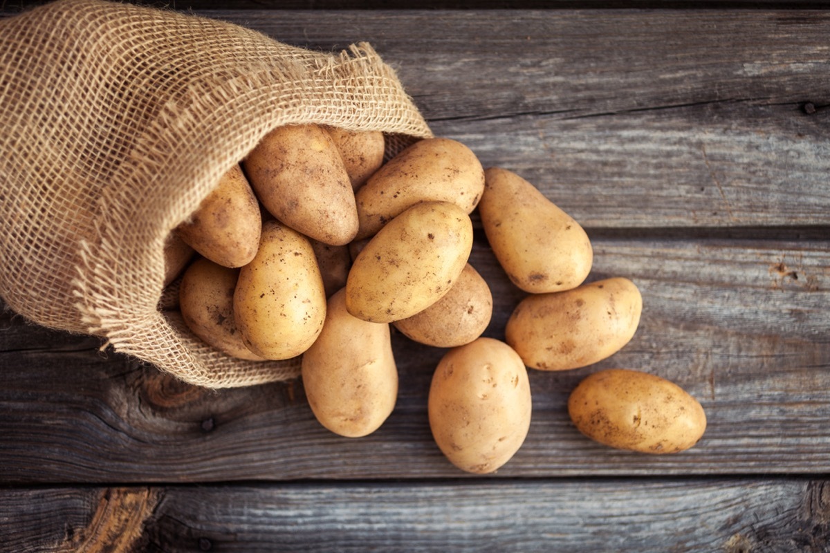 raw potatoes in sack