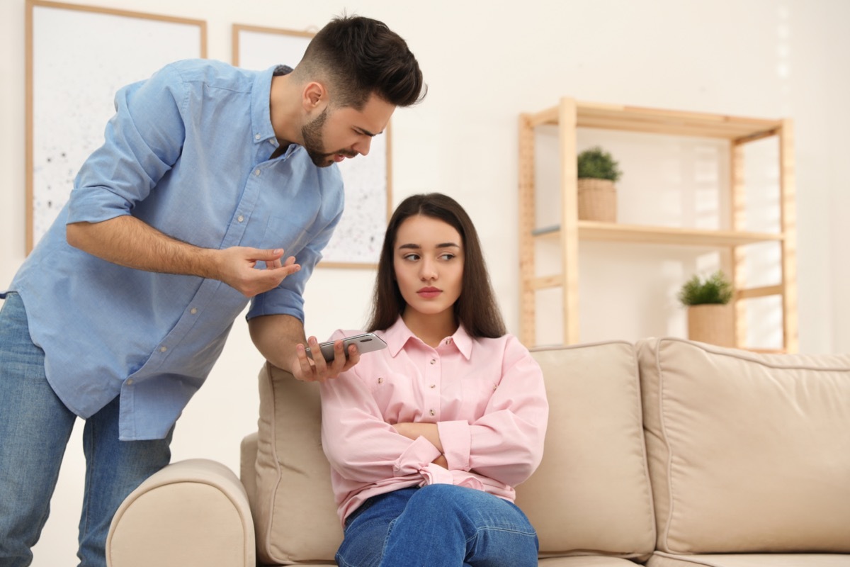 Couple arguing about smart phone