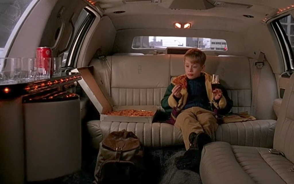 Kevin McAllister in the back of a limo, from Home Alone 2.