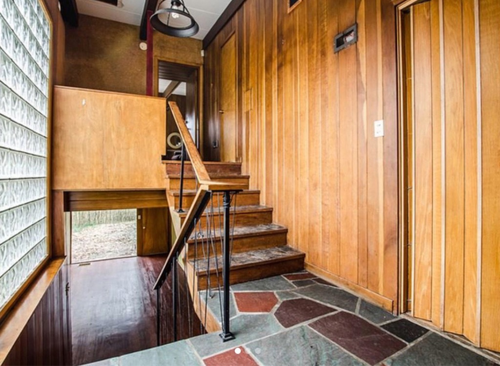 wood paneled foyer