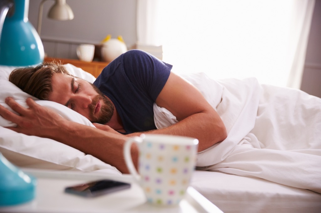 coffee nap man in bed