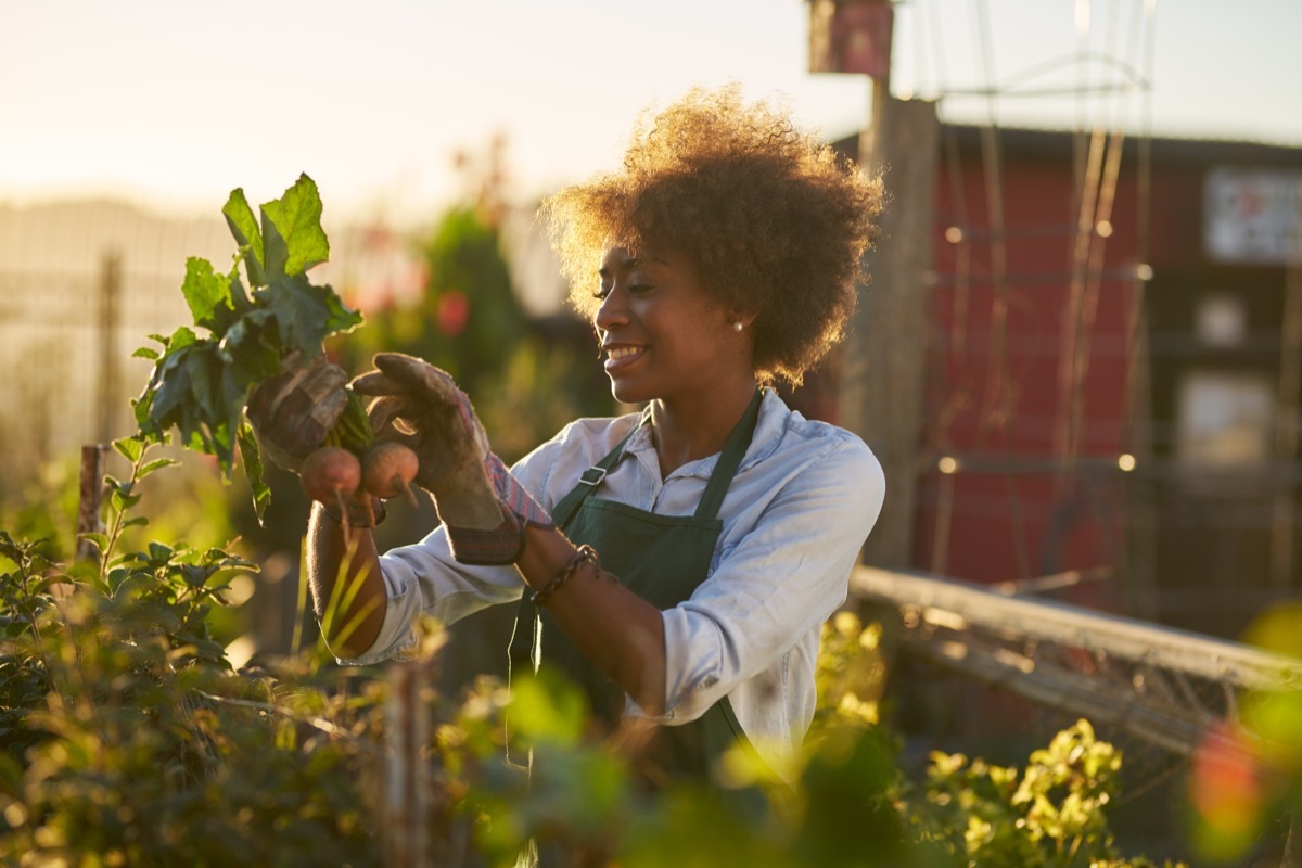 happy woman gardening