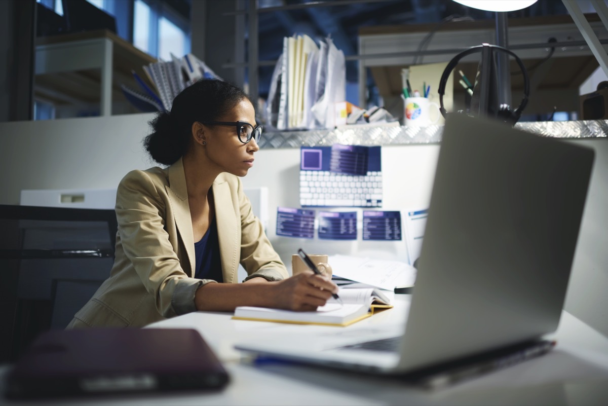 woman staying late at work