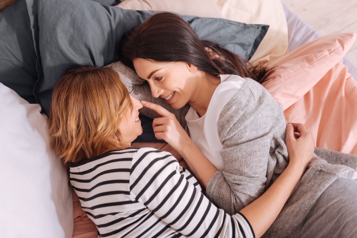 white lesbian couple in bed