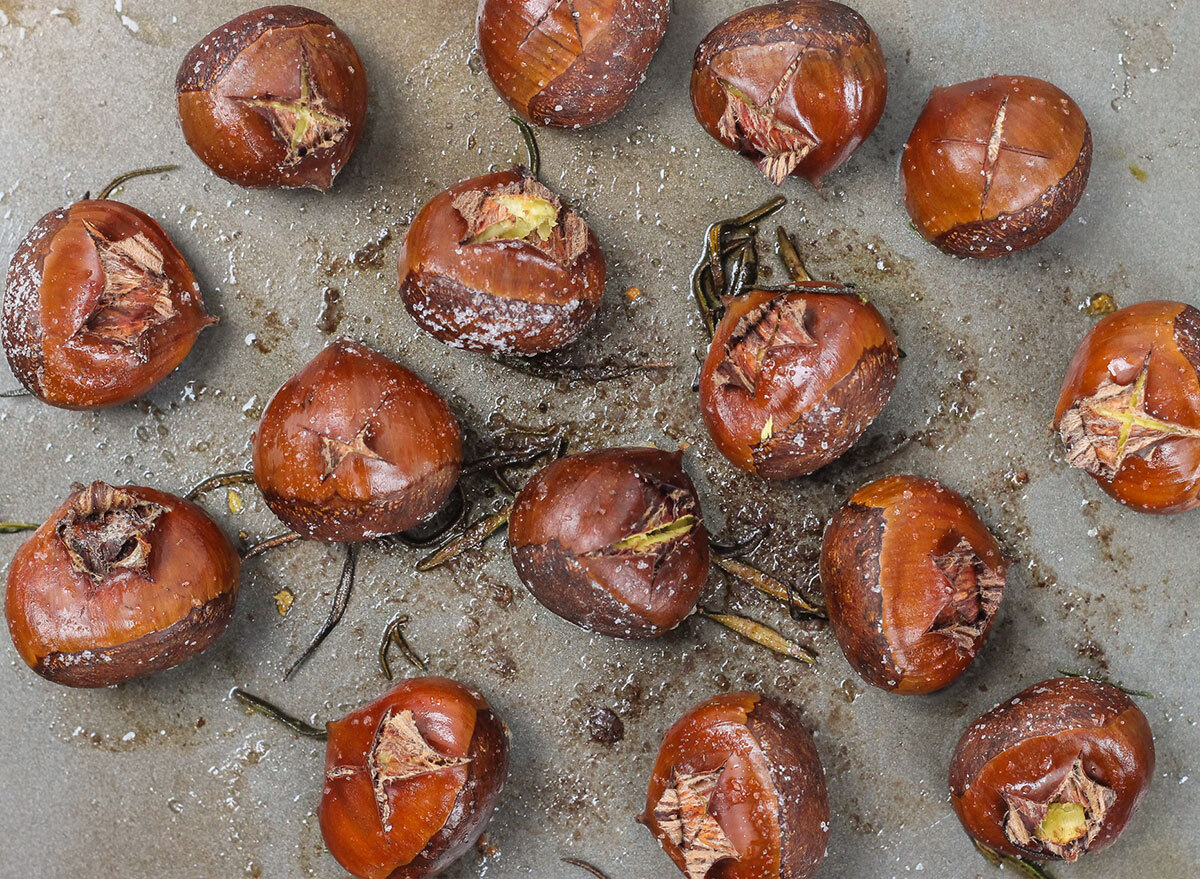 roasted chestnuts on a baking sheet