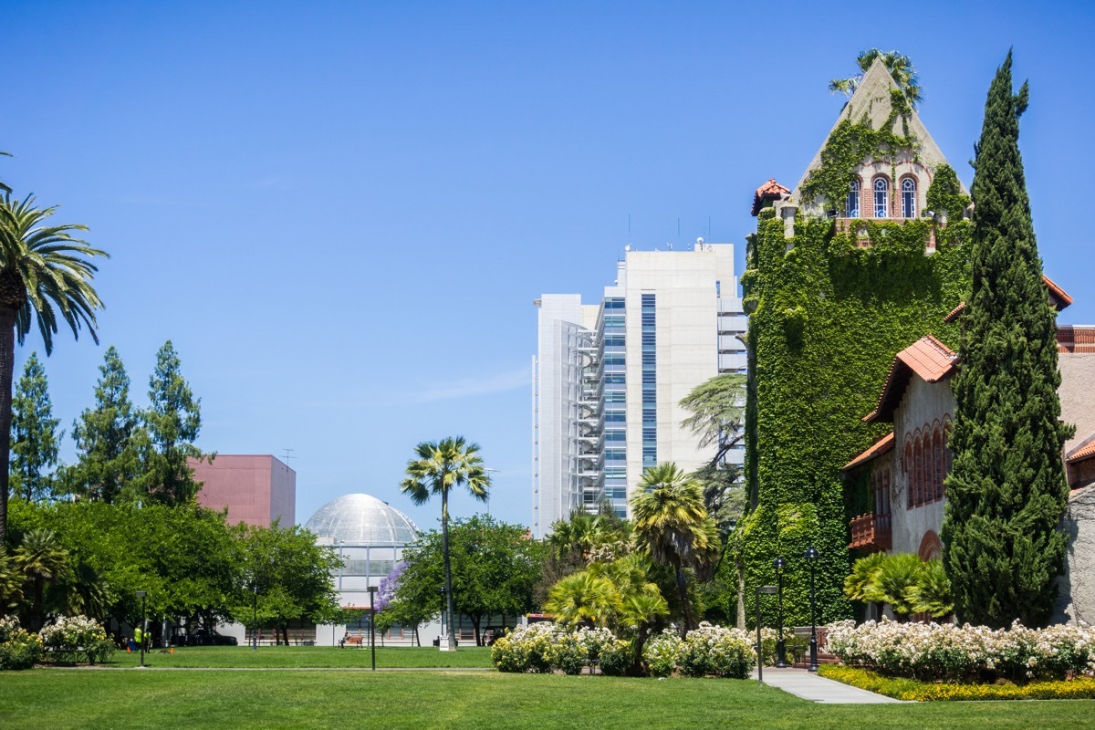 old building at the San Jose State University; the modern City Hall building in the background; San Jose, California (Old building at the San Jose State University; the modern City Hall building in the background; San Jose, California, ASCII, 117 comp