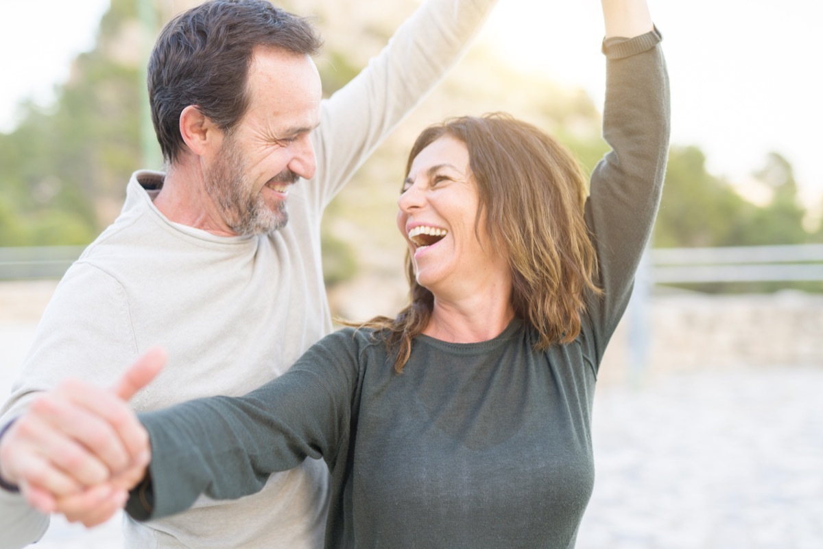 Middle aged couple laughing