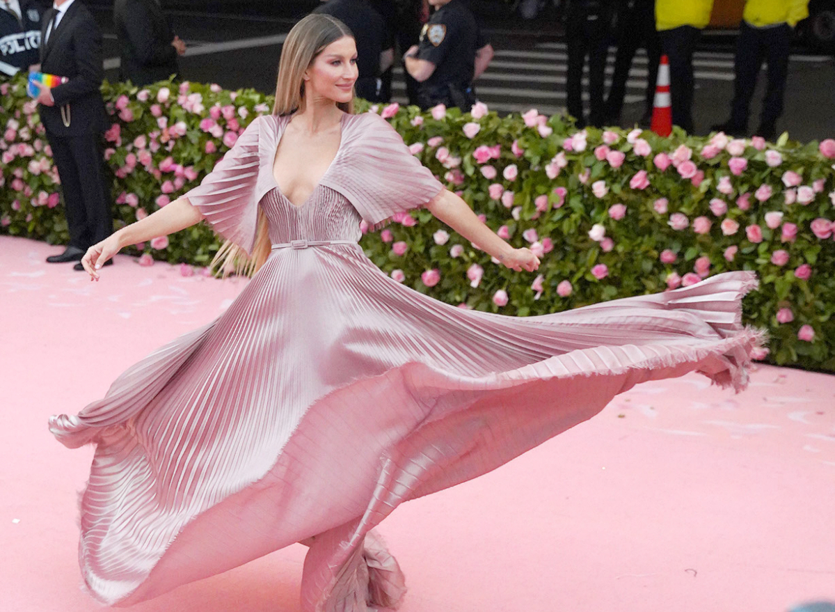 Gisele Bundchen in pink dress on red carpet