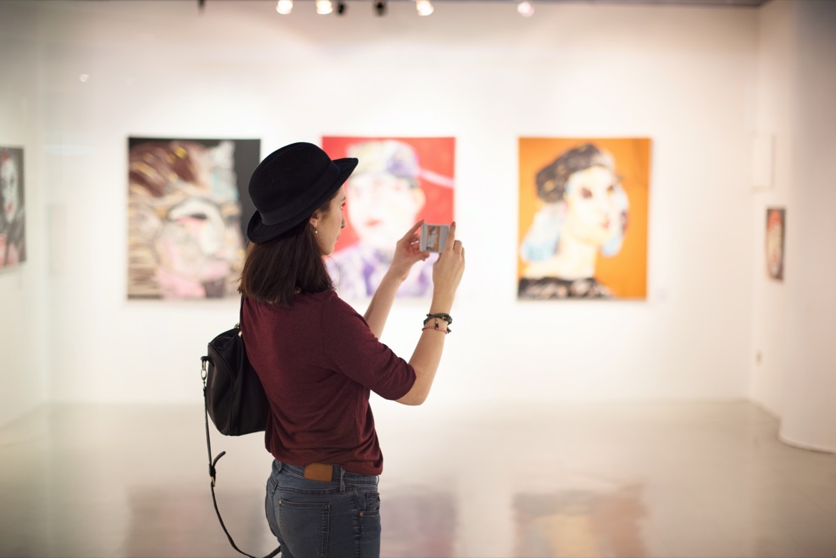 Woman Visiting Art Gallery