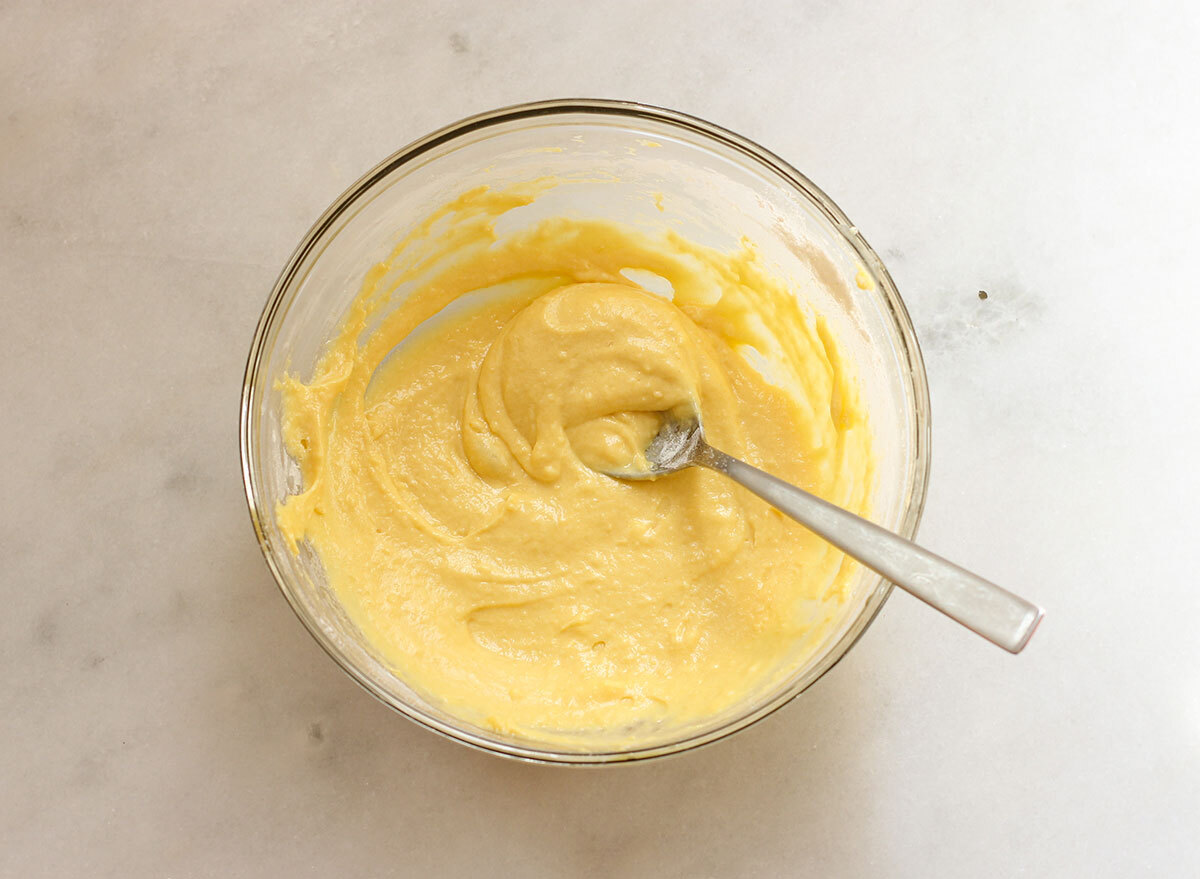 Mixing dumpling mixture in a bowl