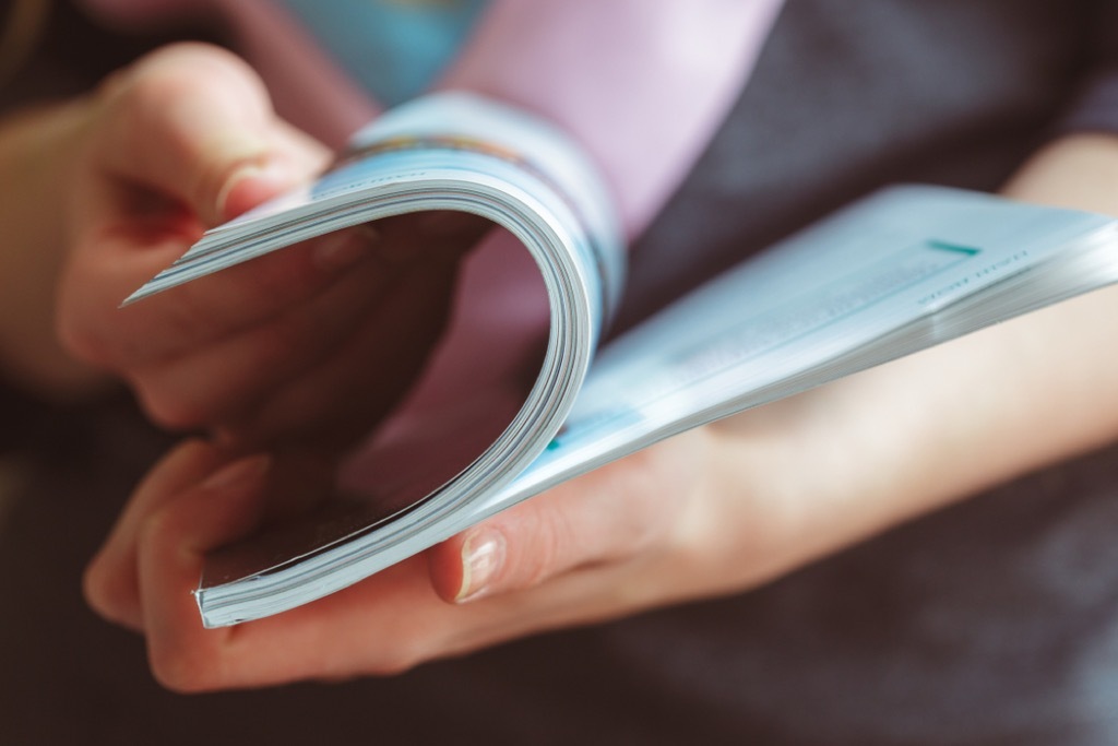 woman reading magazine