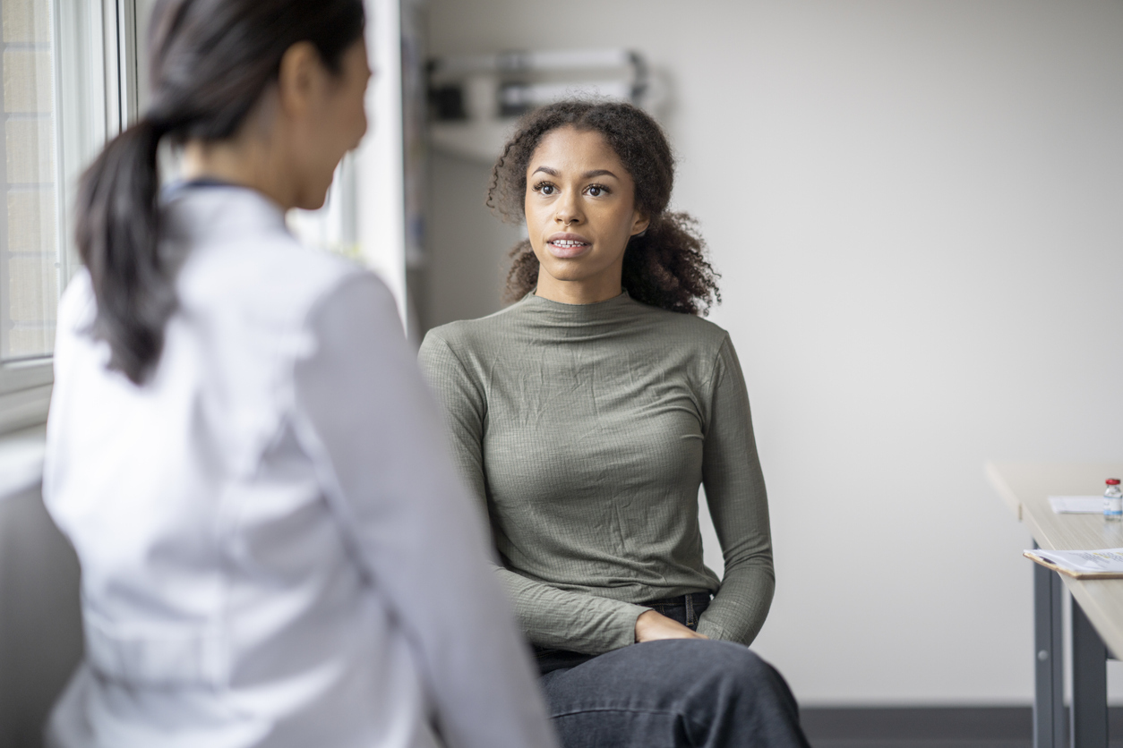 woman talking to her doctor at an appointment