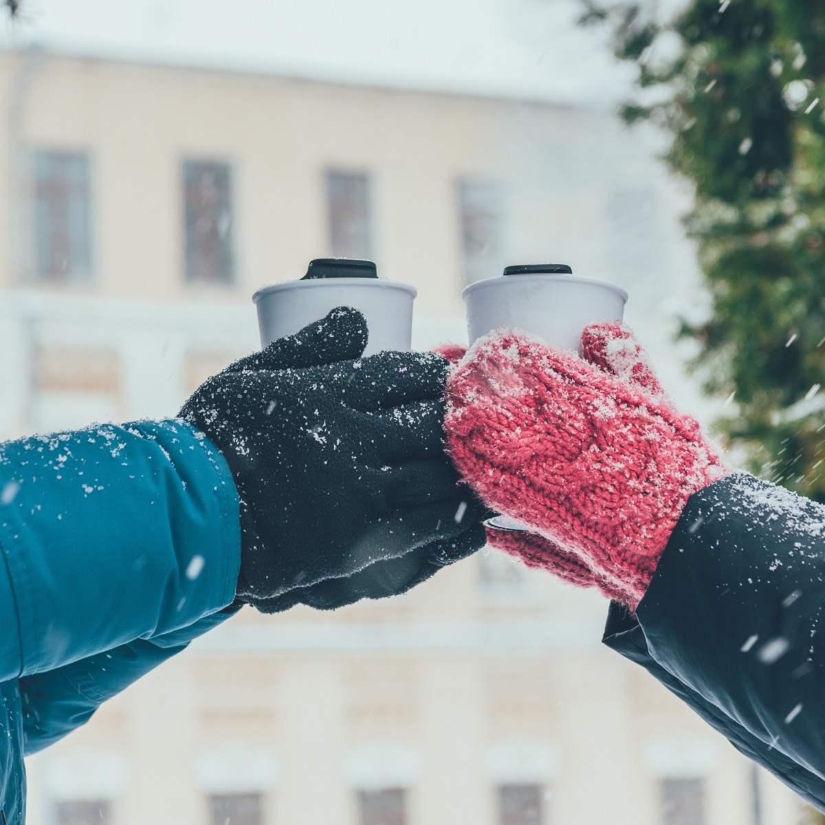 two people holding hands