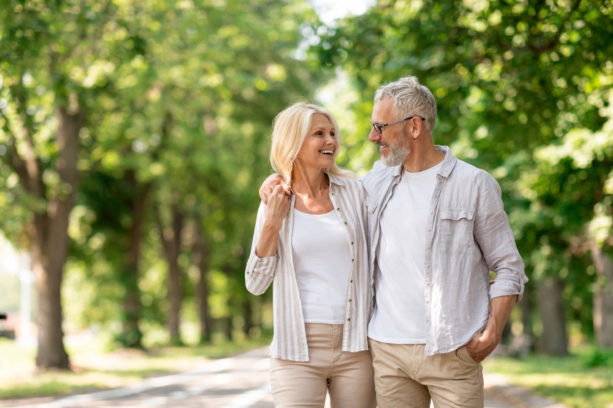 soul ties - couple walking outside near trees