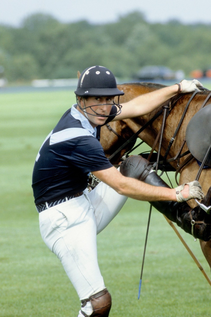 HRH Prince of Wales enjoys an afternoon playing polo at Guards polo club, Windsor, England.. Image shot 1984.