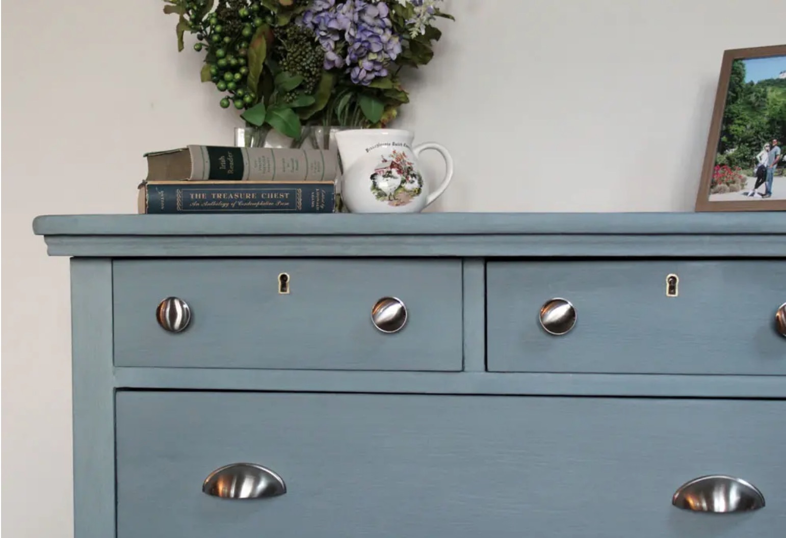 blue dresser with silver drawer pulls