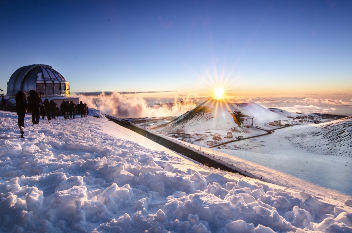 A mountain in hawaii covered in snow