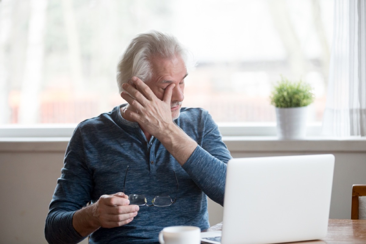 middle aged man rubbing eyes Signs of Poor Health over 50